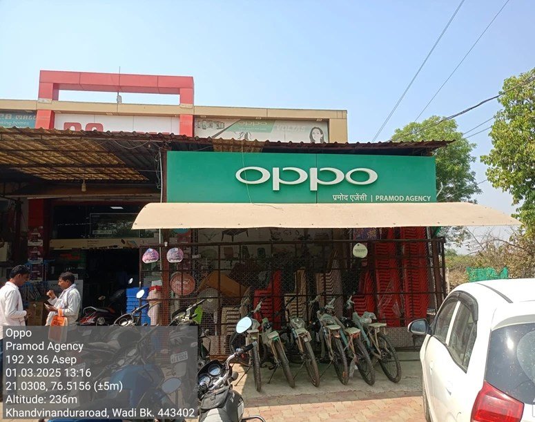 Before — non-lit green OPPO board, Pramod Agency, Wadi, Buldhana
