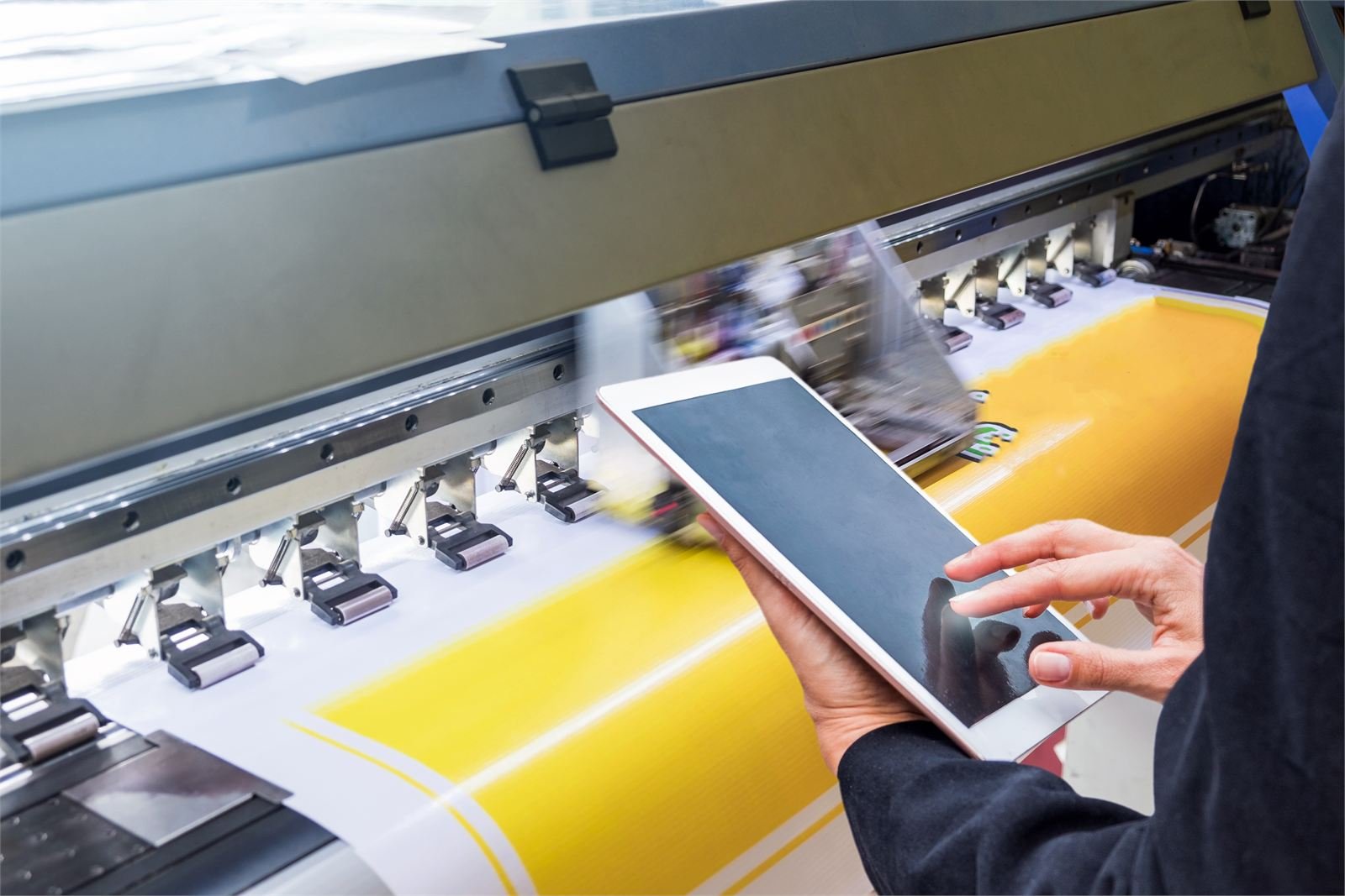 Technician controlling the print run